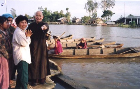 Thich Quang Do leads a UBCV relief mission to aid flood victims in the mekong delta